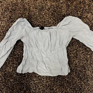 Light blue long sleeved shirt. Kids size large. Brand art class